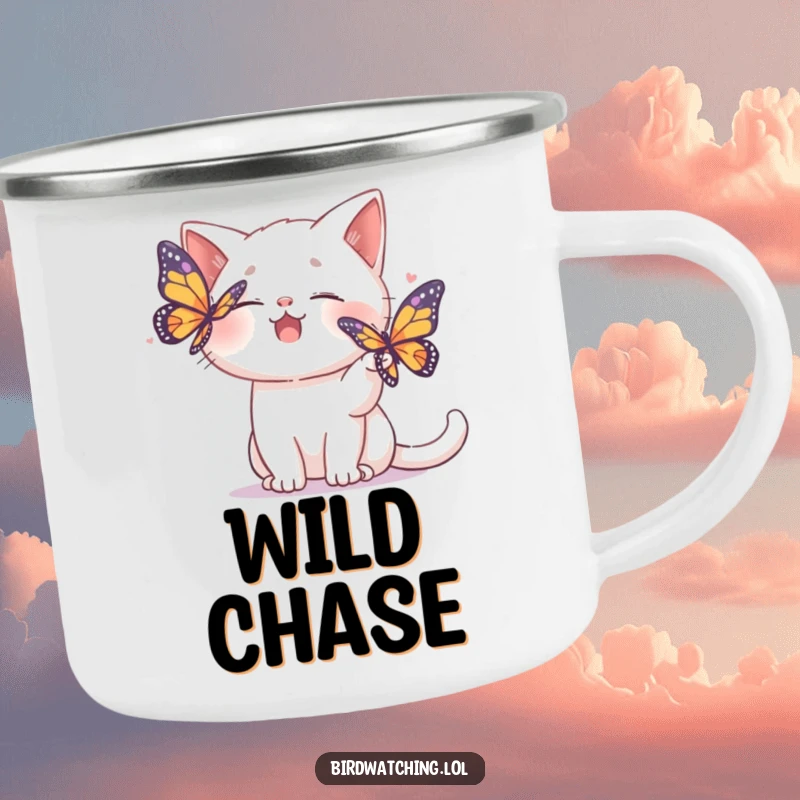 Funny camping mug showing a giggling cat playfully chasing a colorful butterfly, perfect for outdoor fun.