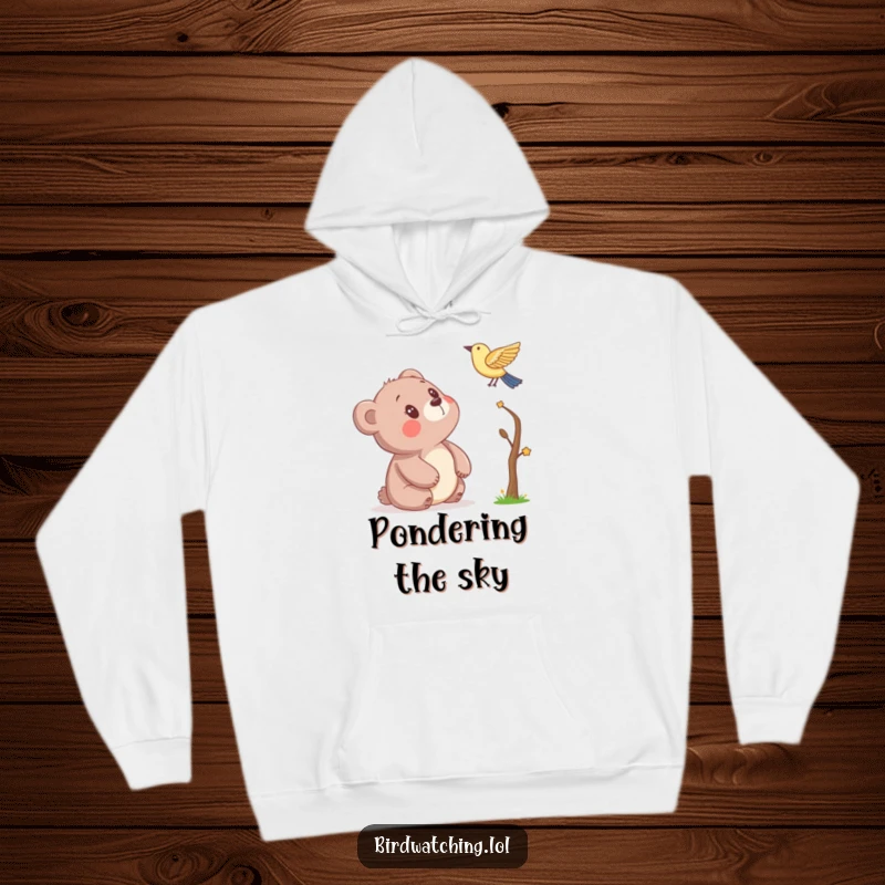 Funny hoodie showcasing a bear's wide-eyed wonder at a bird, crafted for comfort and a touch of humorous, heartwarming appeal as a gift.