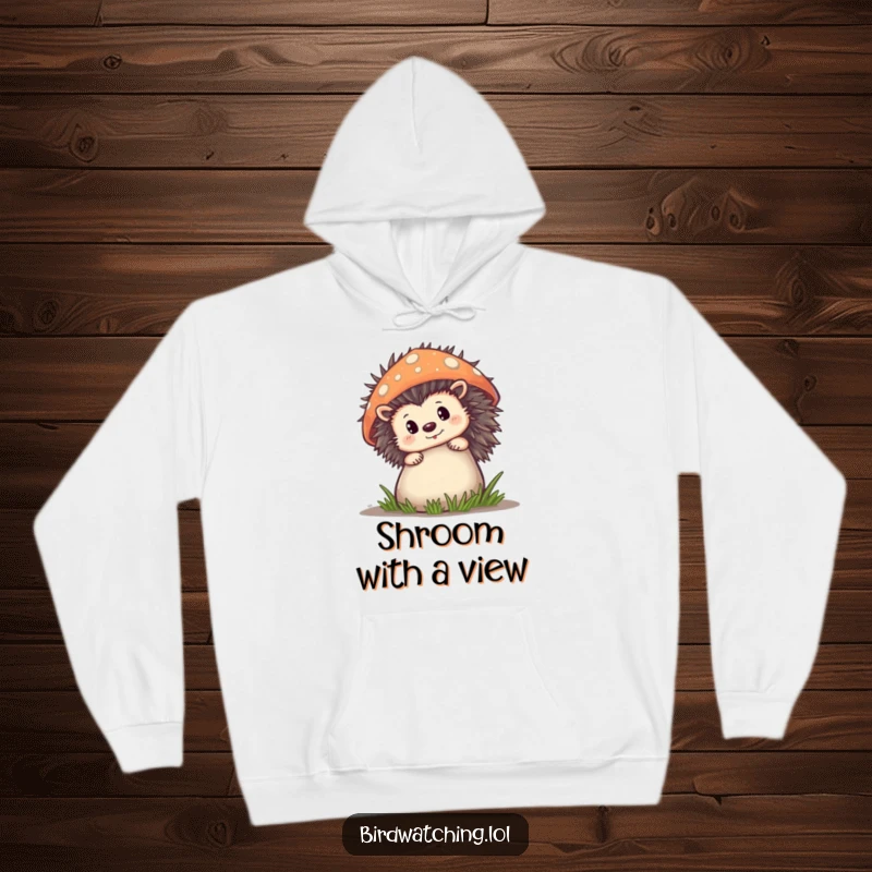Funny Hoodie depicting a curious hedgehog peeking from behind a mushroom, a cozy and humorous addition to any wardrobe.