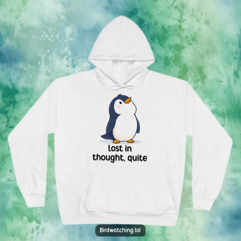 Funny hoodie depicting a wobbly penguin looking up at the sky with wonder, offering cozy comfort and a touch of whimsical inspiration.