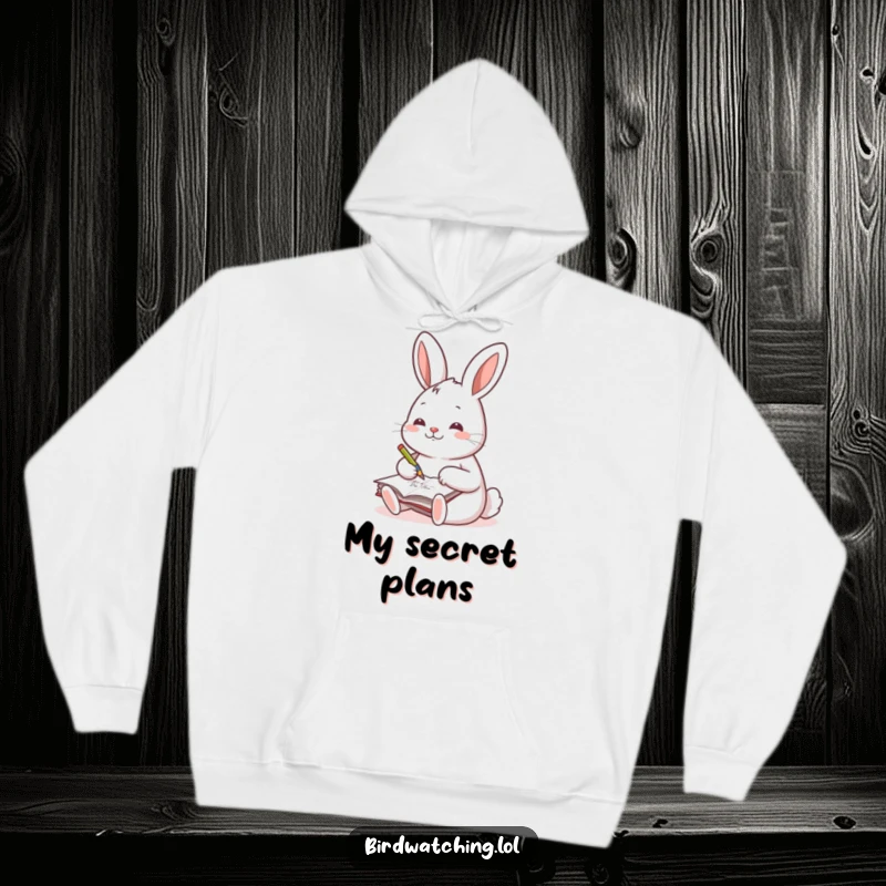 Funny hoodie with a cheerful rabbit writing in a journal, designed for creative individuals and writers.