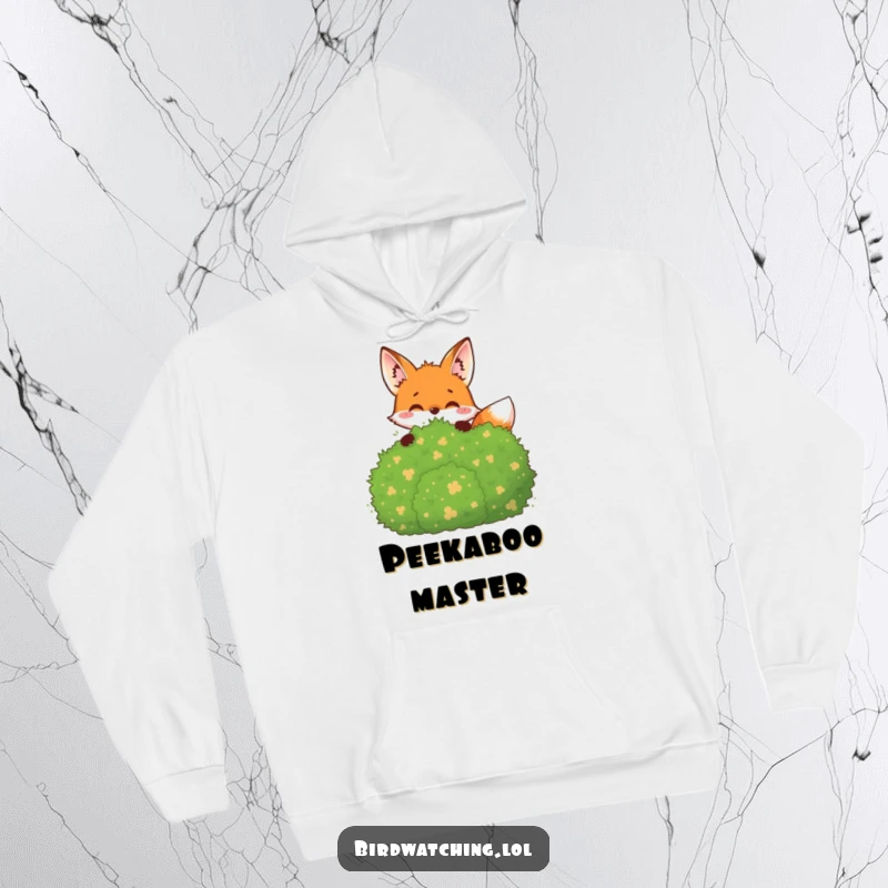 Funny Hoodie: A joyful fox peeking from behind a bush, observing with a playful and curious expression.