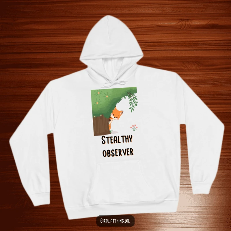 Funny curious fox hoodie, a comfortable sweatshirt featuring a fox peeking from behind a bush, ideal for cozy moments.