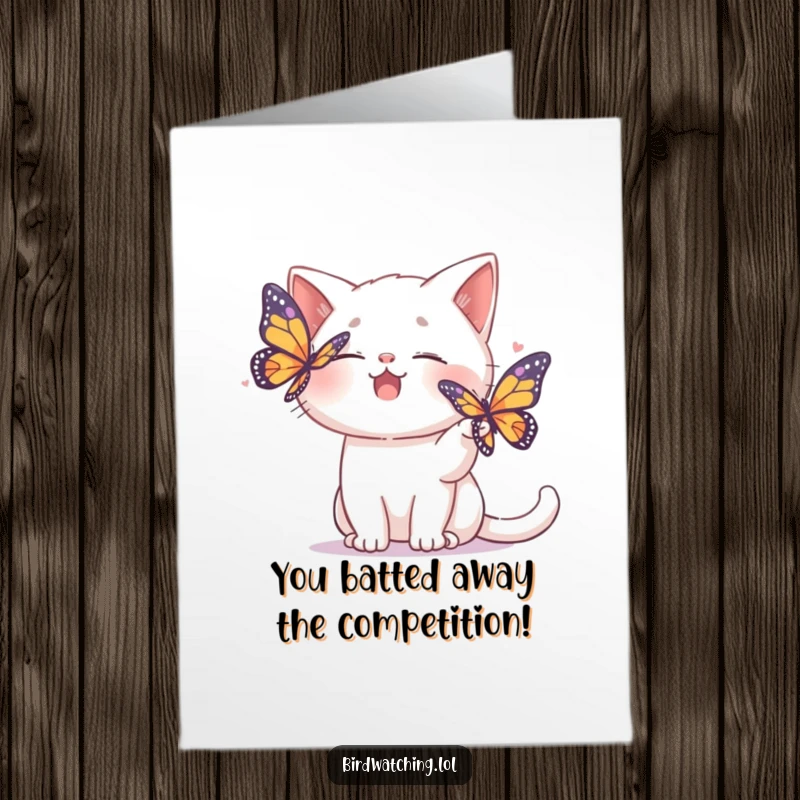 Funny Free Printable Congratulations Card: A giggling cat playfully pretends to shoo away a colorful butterfly, celebrating success.