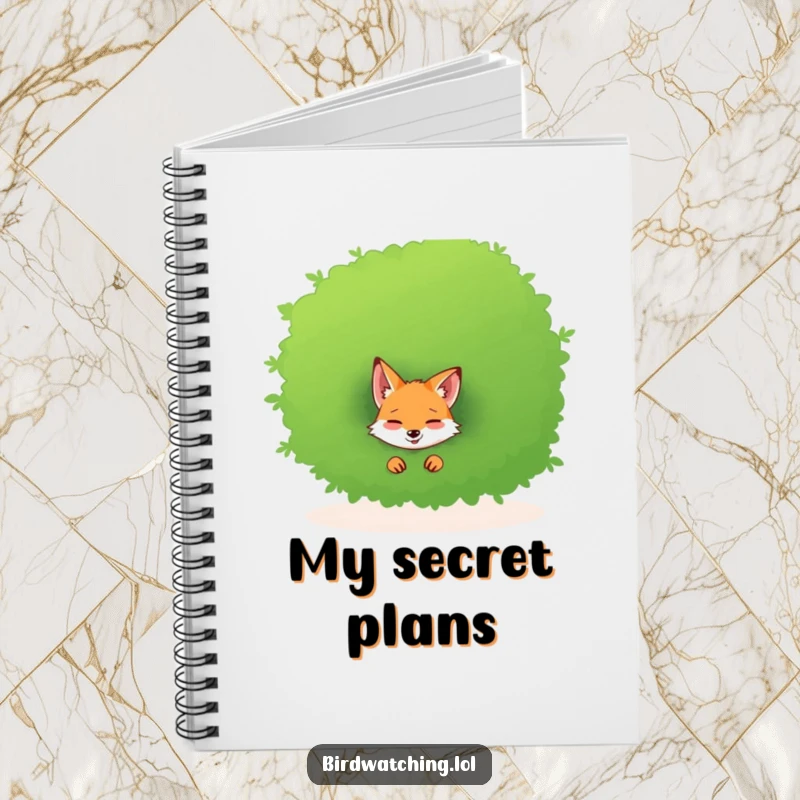 Funny notebook cover featuring a giggling fox peeking from behind a bush, ready to share secrets.
