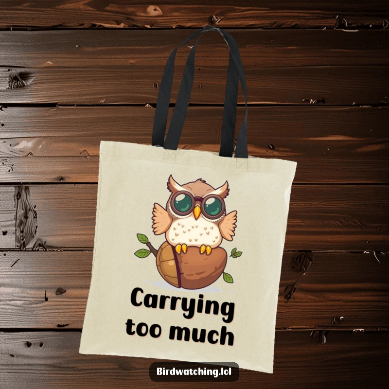 Funny tote bag illustrated with a plump owl wearing oversized binoculars, crashing into a giant acorn, a humorous and eye-catching design.