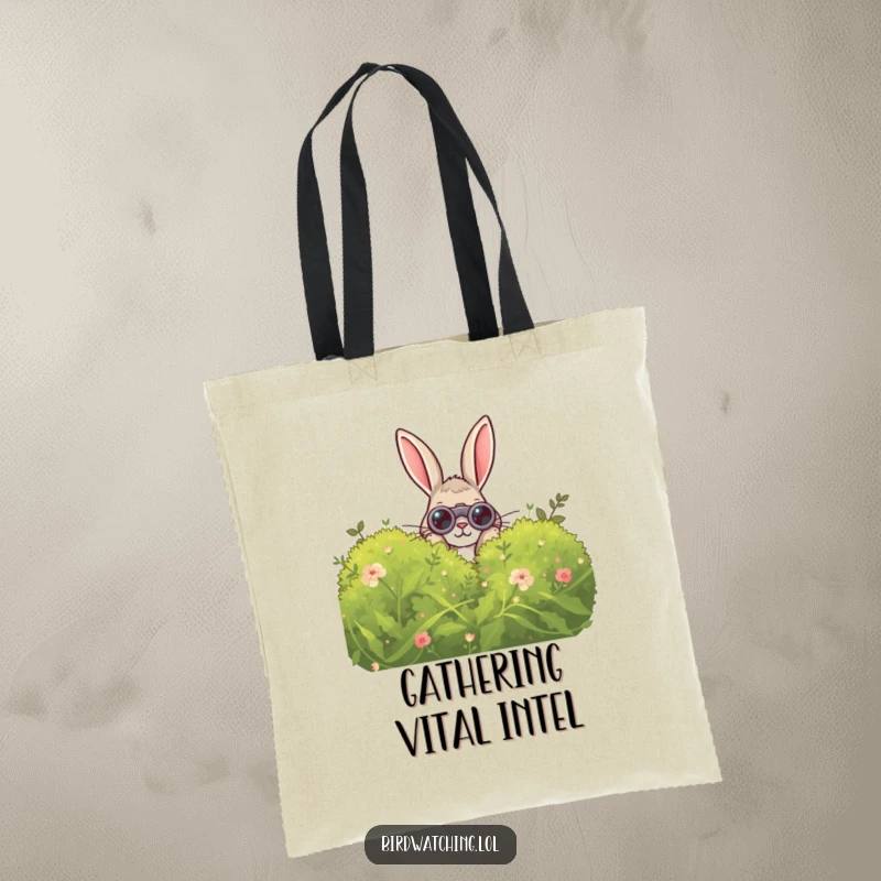 Funny Curious Rabbit Tote Bag: A humorous tote showcasing a curious rabbit peeking with binoculars, perfect for carrying treasures.